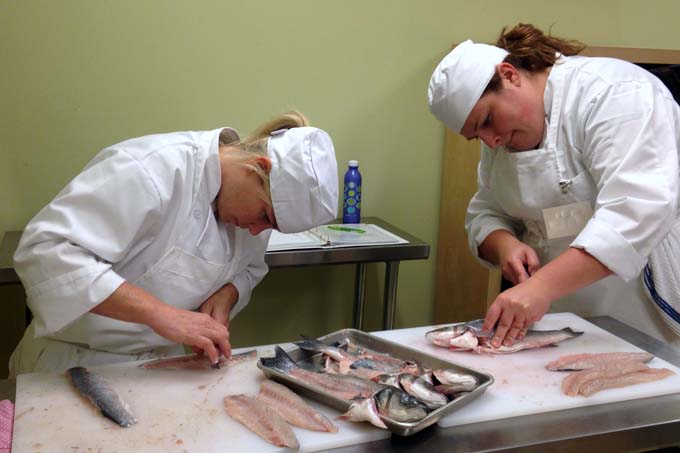 Braise Students Filleting Fish