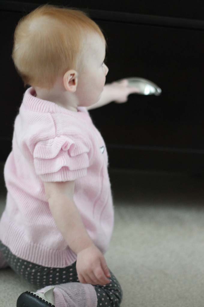 Eight-Month Old Baby Playing in Mommy's Bedroom