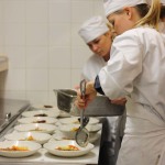 Adding Olive Oil Poached Root Vegetables