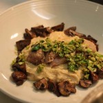 Grilled pork loin with creamy polenta, Brussels Sprout Gremolata & Shiitake Mushrooms